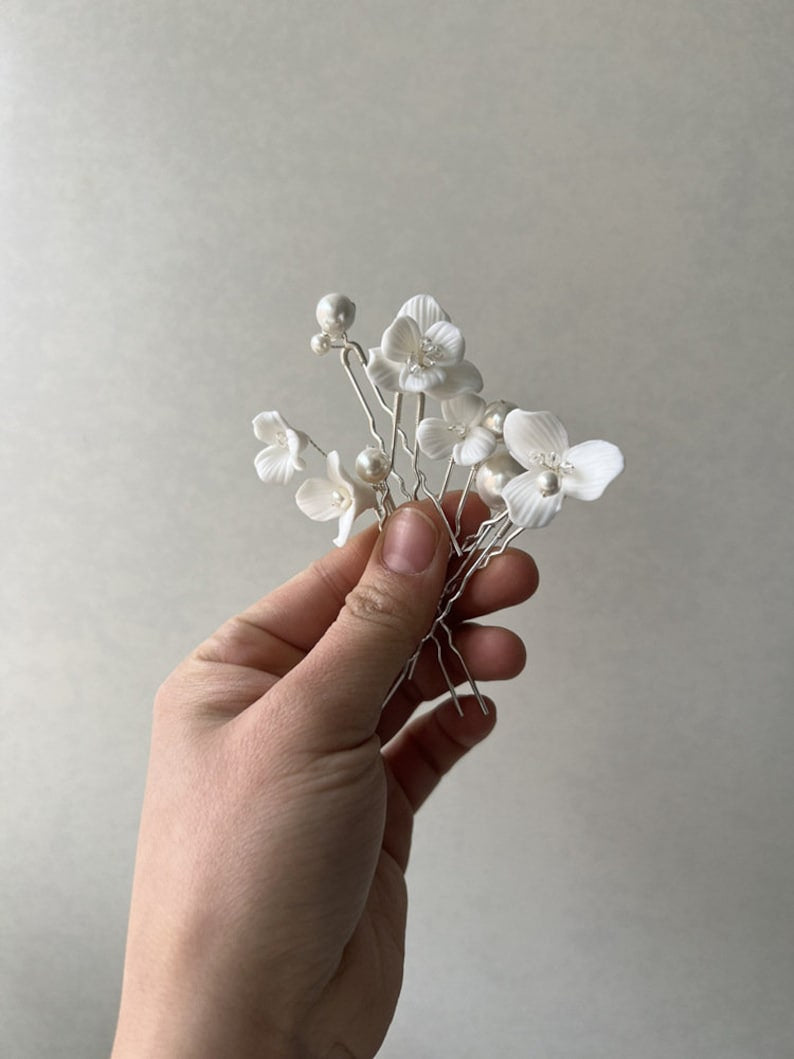 Florcitas blancas de cerámica